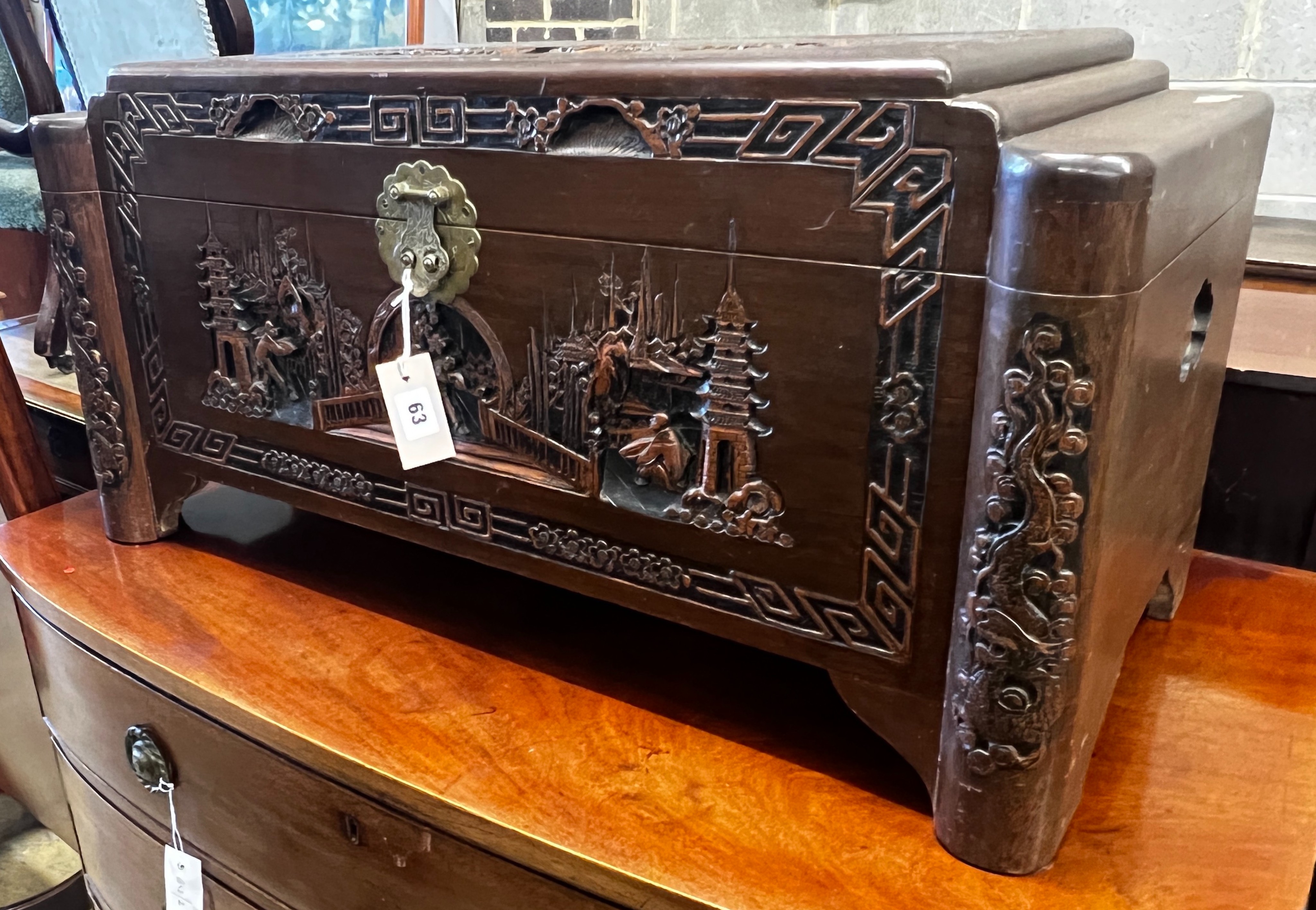 A small Chinese carved camphorwood trunk, length 80cm, depth 38cm, height 40cm